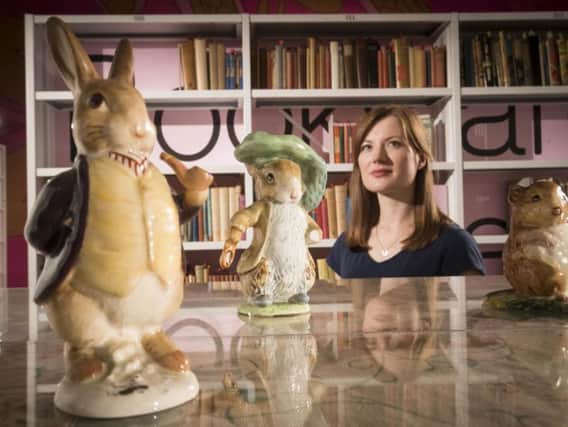 Medical student Helena Sinclair, from Hull, views a display with Beatrix Potter figurines at Larkin: New Eyes Each Year, an exhibition opening this week at the University of Hull's Brynmor Jones Library as part of the Hull UK City of Culture 2017.