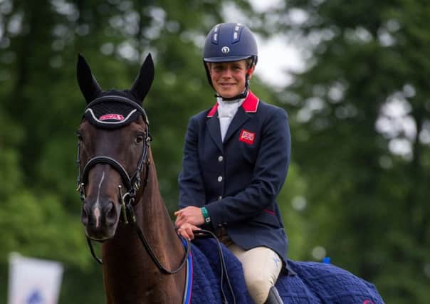 ALL SMILES: Izzy Taylor, on Trevidden, winner of the 2017 CIC three-star at Bramham. Picture by James Hardisty.