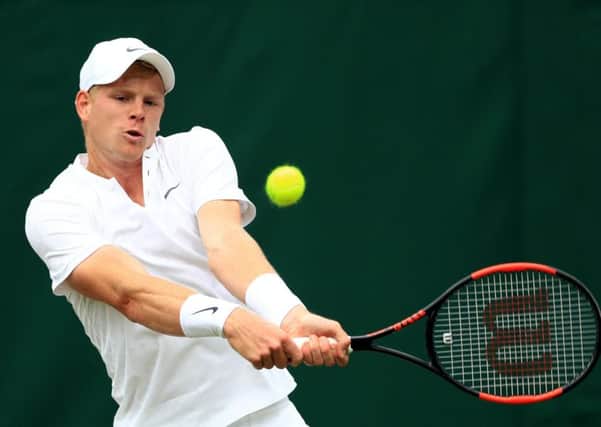 Kyle Edmund in action against Alex Ward on day two of Wimbledon as the Yorkshireman ended his wait for a win at SW19 (Picture: John Walton/PA Wire).