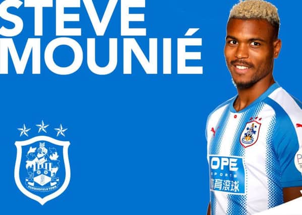 Record buy: Huddersfield Town's new Benin international striker Steve MouniÃ© from Montpellier.