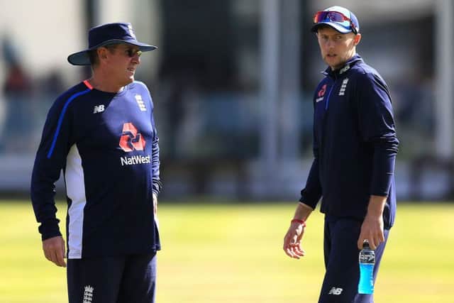 England's captain Joe Root (right) talks to head coach Trevor Bayliss during the nets session at Lord's. Picture: Nigel French/PA