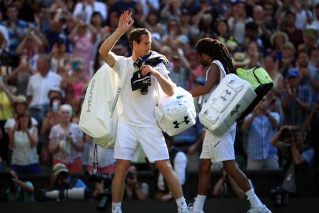 JOB DONE: Andy Murray celebrates victory over Dustin Brown. Picture: John Walton/PA