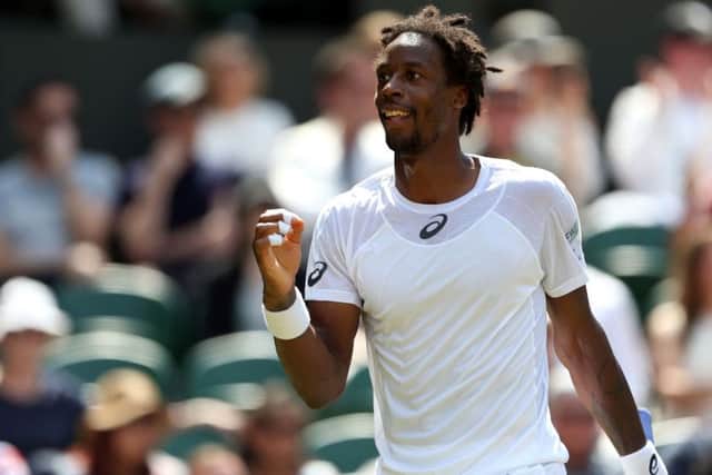 Gael Monfils on his way to victory against Kyle Edmund on Centre Court. Picture: Steven Paston/PA