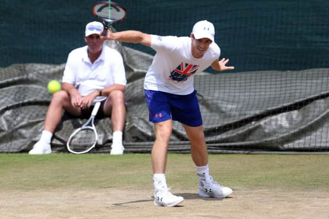 Andy Murray practises yesterday under the gaze of his coach Ivan Lendl  (Picture: Steven Paston/PA Wire).