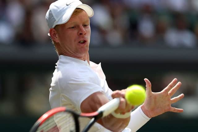 Kyle Edmund returns during his match against Gael Monfils, the Yorkshireman's first on the Centre Court at Wimbledon (Picture: Steven Paston/PA Wire).