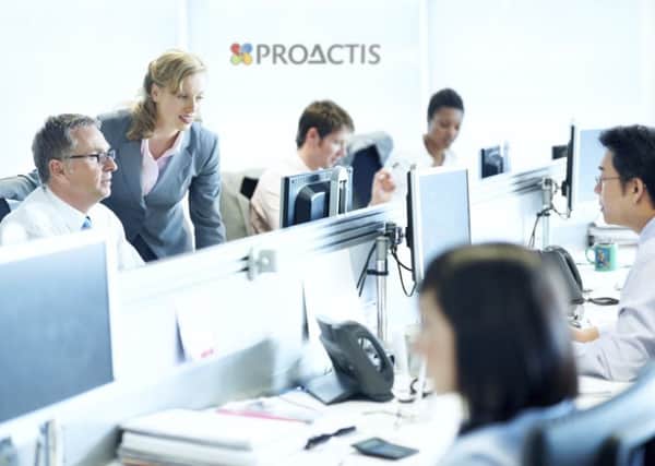 A group of office workers at Proactis.