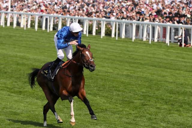 Barney Roy ridden by jockey James Doyle on his way to winning the St James's Palace Stakes.