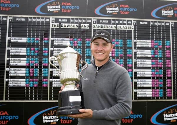 Huddersfields Nick Marsh with the Dawson & Sanderson Classic trophy (Picture: HotelPlanner.com PGA EuroPro Tour).