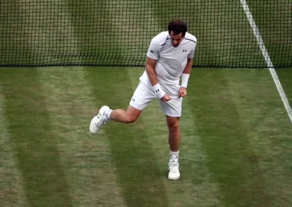Defending champion Andy Murray bellows in delight after winning a tough encounter with Italian Fabio Fognini to claim a place in the fourth round at Wimbledon where he will play Frenchman Benoit Paire (Picture: John Walton/PA Wire).