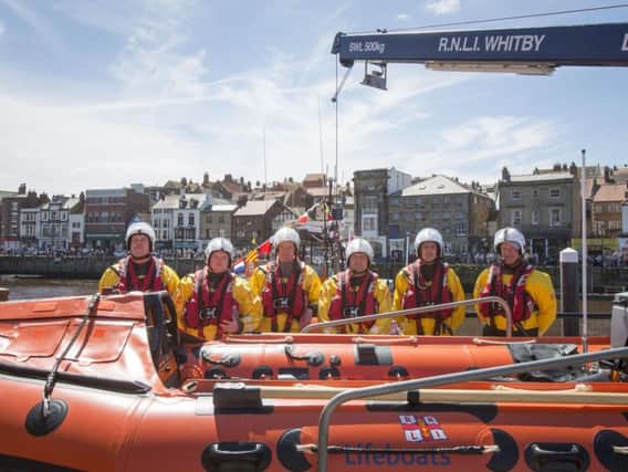 RNLI crew with their new in-shore lifeboat