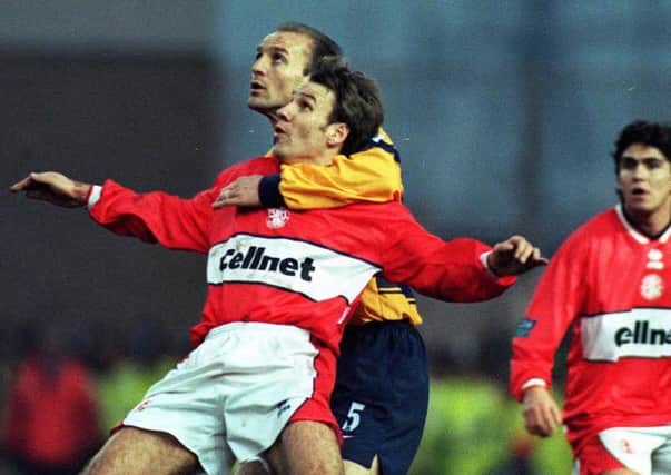 HELLO AGAIN: Middlesbrough and Paul Merson, in action for Middlesbrough against former club Arsenal back in 1997. Picture: John Giles/PA.