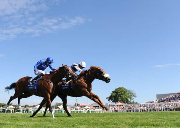 Jim Crowley on board Ulysses (far side) wins ahead of James Doyle on board Barney Roy in the Coral-Eclipse at Sandown. Picture: Daniel Hambury/PA