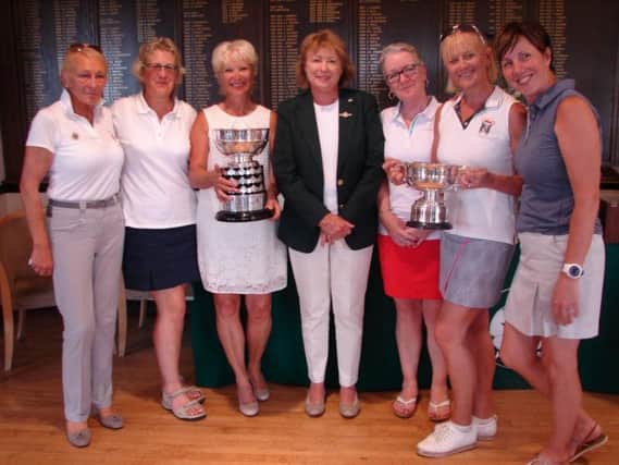 Lindsey Lee holds the Yorkshire Challenge Bowl alongside, l-r, Tankersley Park captain Gina Midgley, vice captain Gill Guest, YLCGA captain Fran Dickson, Sally Armstrong, Karen Elliott and Vicky Taylor Davis.