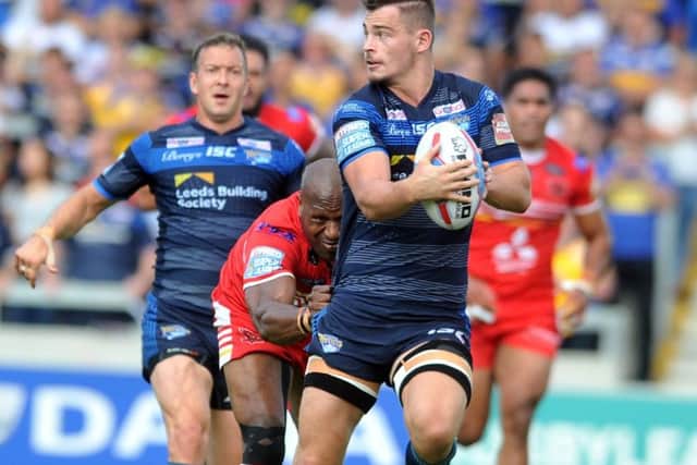Leeds 
Rhinos' Stevie Ward shows a clean pair of heels to Red Devils' Rob Lui. (Picture: Tony Johnson)