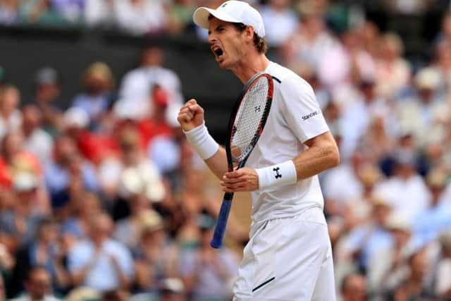 Andy Murray celebrates against Benoit Paire. Picture: Adam Davy/PA