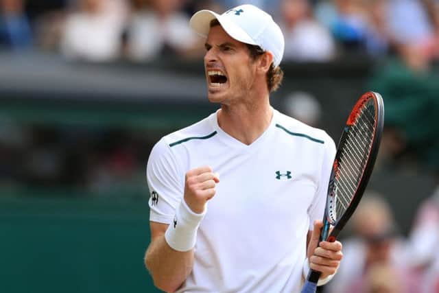 Andy Murray celebrates after winning a point against Benoit Paire (Picture: Adam Davy/PA Wire).