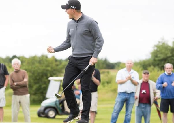 Huddersfield's Nick Marsh roars with delight after holing the winning putt in the Dawson & Sanderson Classic (Picture: HotelPlanner.com PGA EuroPro Tour).