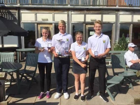 Malton & Norton's team with their trophies after winning the Yorkshire Inter-District Union junior team title at Sandburn Hall.