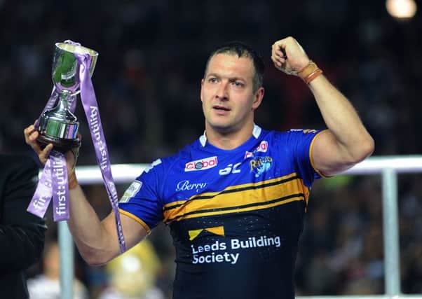 Danny McGuire with the Harry Sunderland trophy he won in the 2015 Grand Final (Picture: Jonathan Gawthorpe)