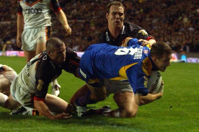 Danny McGuire scores the winning try for Leeds in the 2004 Grand Final with Bradford.