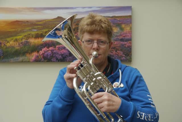 Former army nurse Anita Bartram has gone back to playing her Eflat tenor horn after being helped by Phoenix House