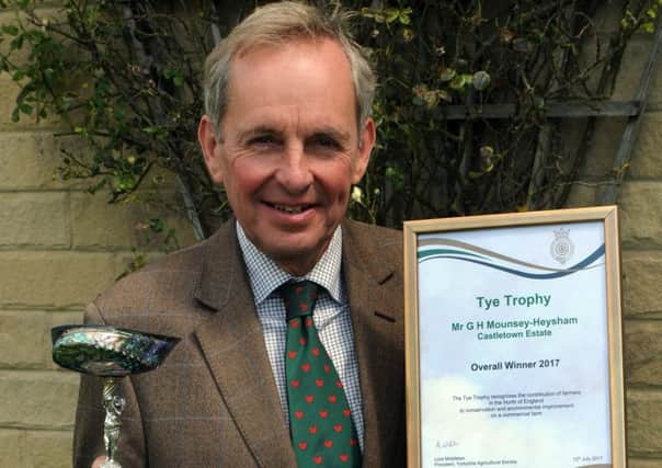 Giles Mounsey-Heysham, of Castletown Estate, Rockliffe, Cumbria with the Tye trophy and overall winner certificate.
