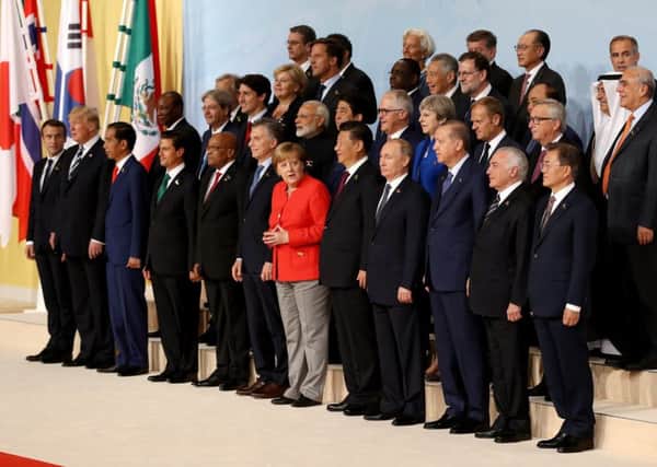World leaders pose for a family photo during the G20 summit in Hamburg.