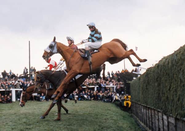 Tommy Carberry and L'Escargot clear Becher's Brook in the 1975 Grand National: Photo by Colorsport/REX (3157308a).