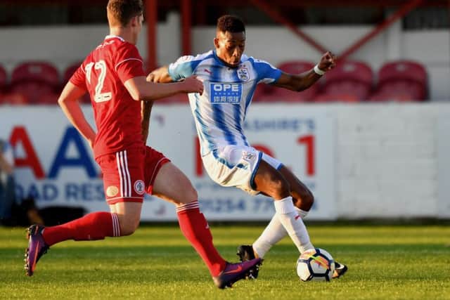 Huddersfield Town's Rajiv Van La Parra (right) in action against Accrington on Wednesday night. Picture: Anthony Devlin/PA