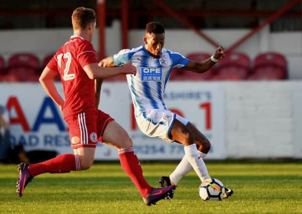 Huddersfield Town's Rajiv Van La Parra (right) in action against Accrington on Wednesday night. Picture: Anthony Devlin/PA