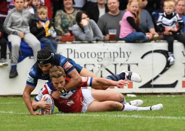 CONFIDENT: Kyle Wood, seen recently scoring against Leeds Rhinos. Picture: Bruce Rollinson