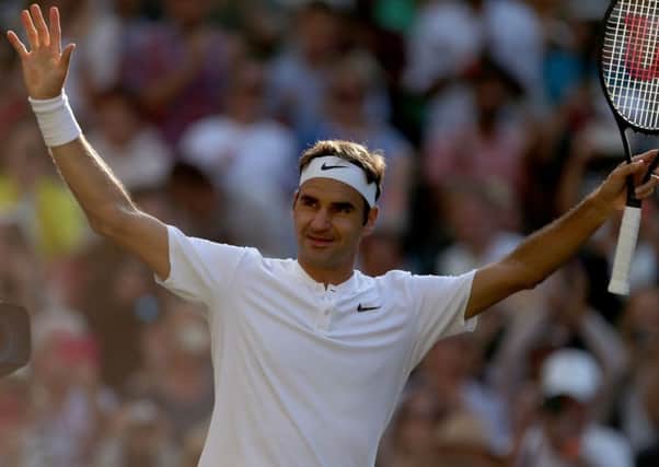 Roger Federer celebrates beating Milos Raonic on day nine of the Wimbledon Championships at The All England Lawn Tennis and Croquet Club, Wimbledon.  (Picture: PA)