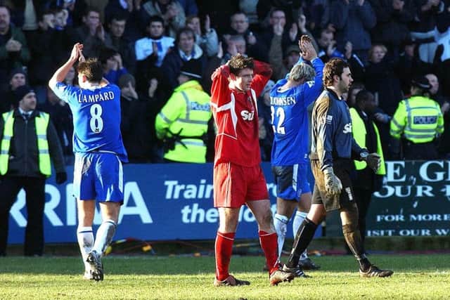 GREAT DAYS: Dejection for Colin Cryan of Scarborough Chelsea's Frank Lampard (left) and Eidur Gudjonsson celebrate a 1-0 FA Cup win at Seamer Road back in 2004. PA/ John Giles