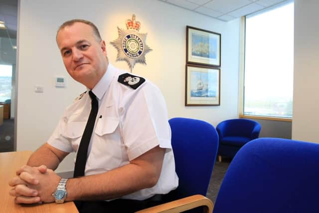 Stephen Watson has pledged to return more officers to neighbourhood policing.