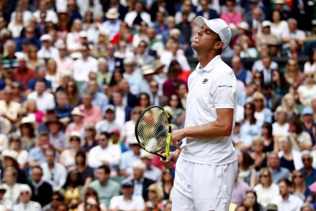 Sam Querrey shows his frustration on his way to semi-final defeat to Marin Cilic. Picture: Nic Bothma/PA