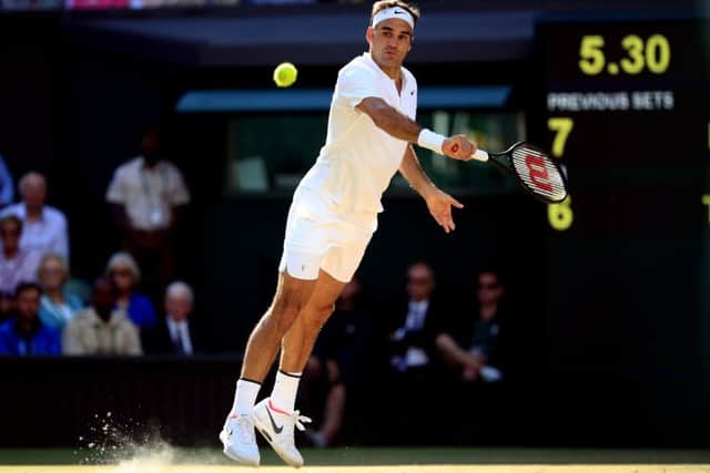 Roger Federer plays against Tomas Berdych. Picture: John Walton/PA.