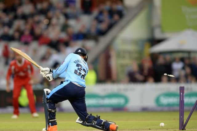 Tom Kohler-Cadmore is bowled by Ryan McLaren for 12 at Old Trafford. Picture: Bruce Rollinson.
