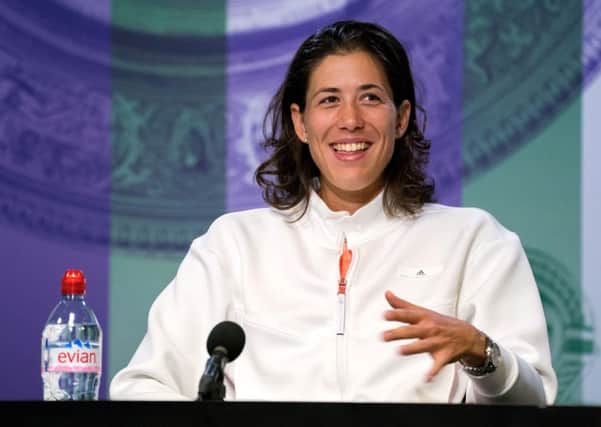 All smiles: Garbine Muguruza in the press conference after her Wimbledon triump, which owed much to Conchita Martinezs influence.