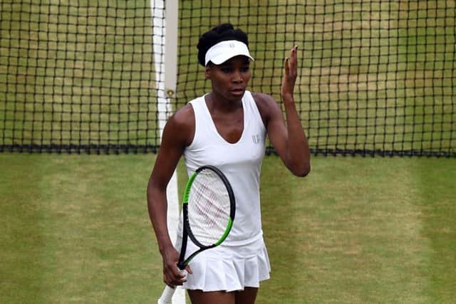 Venus Williams looks dejected during the Ladies Singles final against Garbine Muguruza