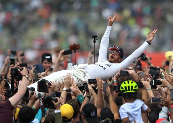 Lewis Hamilton celebrates his victory in the 2017 British Grand Prix at Silverstone. Picture: David Davies/PA
