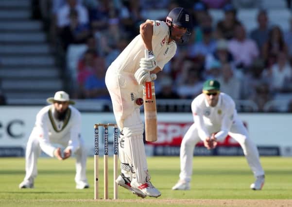 England's Alastair Cook narrowly avoids being out LBW late on day three at Trent Bridge. Picture: Nick Potts/PA.