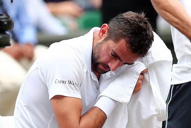 Marin Cilic shows his frustration and disappointment during the men's singles final against Roger Federer on Sunday at Wimbledon. Picture: Gareth Fuller/PA