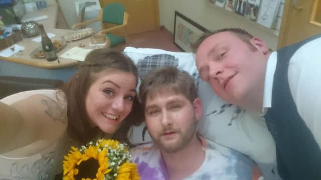 Amie Knott with her brother Andrew (centre) and husband David in the Palliative Care Unit at Sheffield's Norther General Hospital