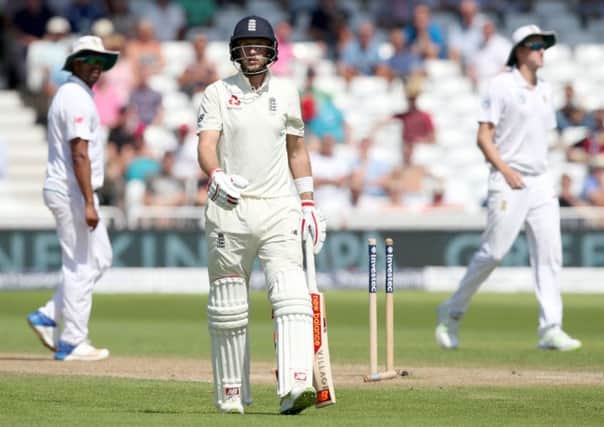 England's Joe Root walks off after being dismissed by South Africa's Chris Morris at Trent Bridge: Nick Potts/PA.