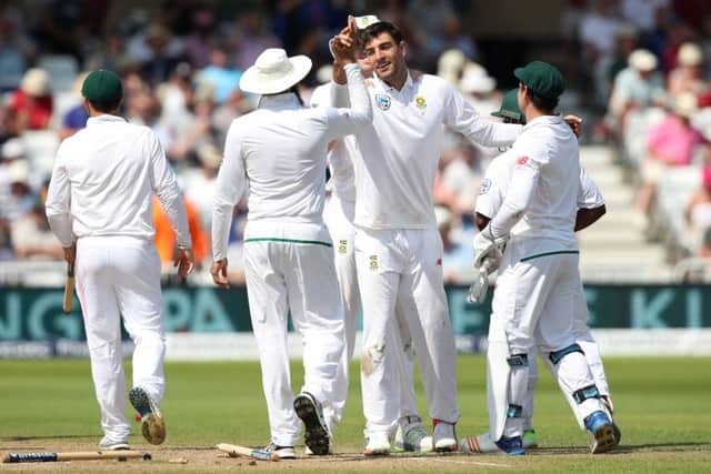 South Africa's Duanne Olivier celebrates the wicket of England's James Anderson. Picture: Nick Potts/PA.