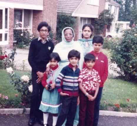 Adil Ray (front centre) with his maternal grandmother Aisha and his cousins - circa 1982.  PA Photo/BBC/Wall to Wall Media/Nargis Din.