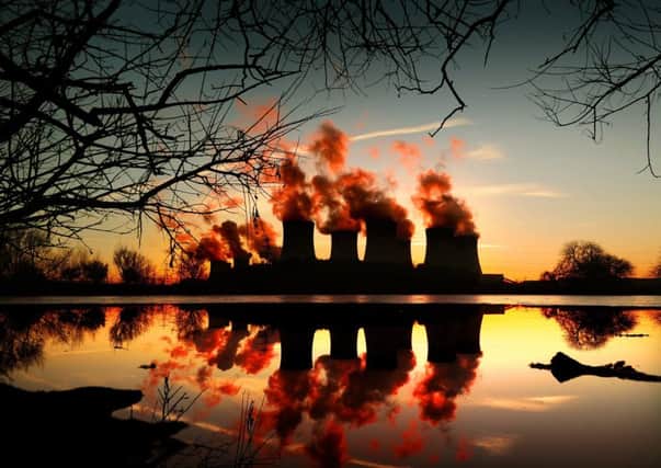 The Sun sets behind Drax Power Station. Picture by Simon Hulme