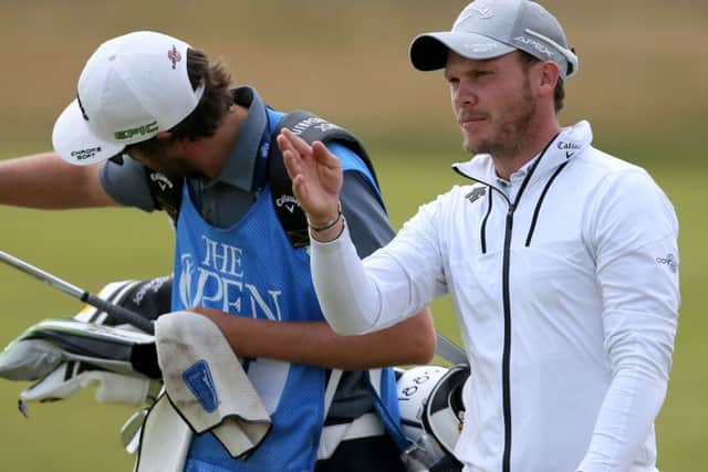 England's Danny Willett speaks with his caddie during practice day four of The Open Championship 2017 at Royal Birkdale Golf Club, Southport.