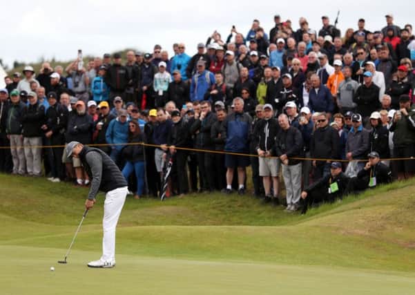 the USA's Jordan Spieth holes a putt on his way to a five-under-par 65 at Royal Birkdale (Picture: Andrew Matthews/PA Wire).