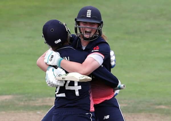 England Women's Anya Shrubsole celebrates hitting the winning runs with Jenny Gunn (left) against South Africa Women.